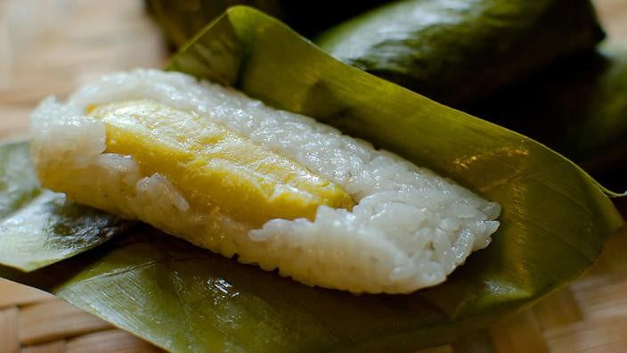 Num Ansom Chek: A Banana Rice Cake Wrapped in Banana Leaves